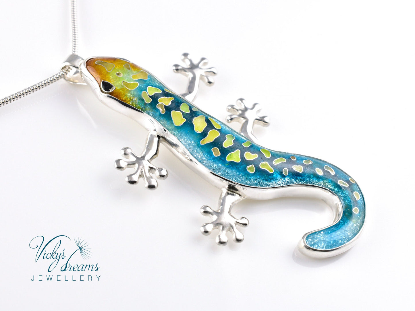 Handcrafted cloisonné enamel necklace with blue, yellow, and orange lizard design set in sterling silver.