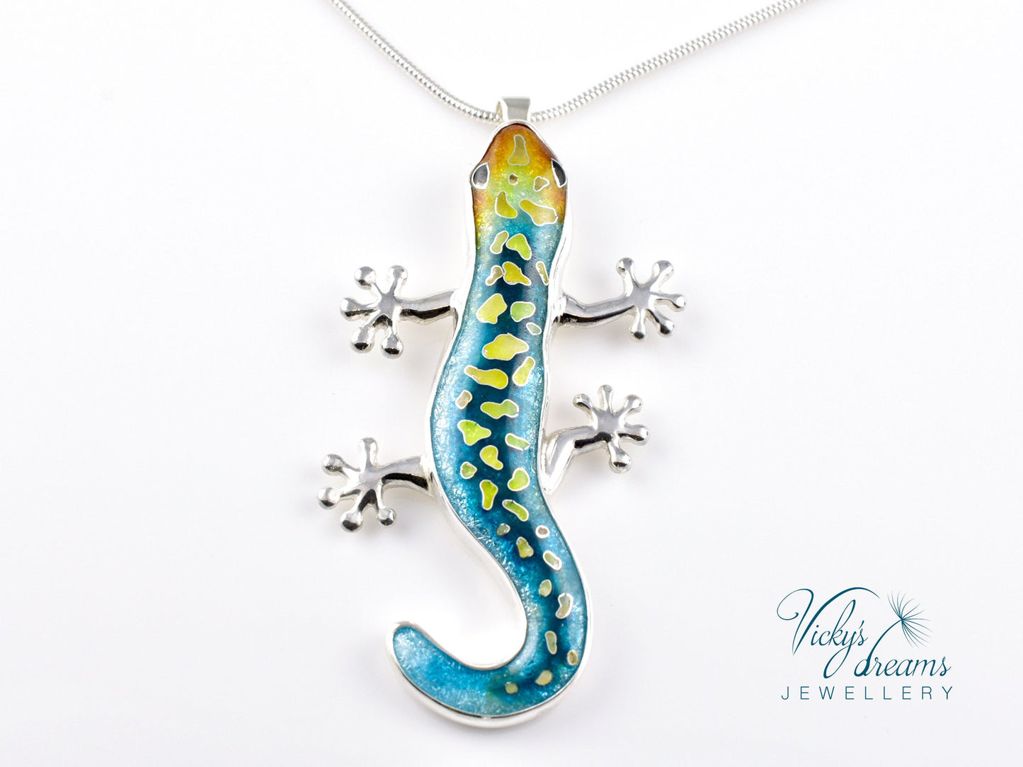Handcrafted cloisonné enamel necklace with blue, yellow, and orange lizard design set in sterling silver.
