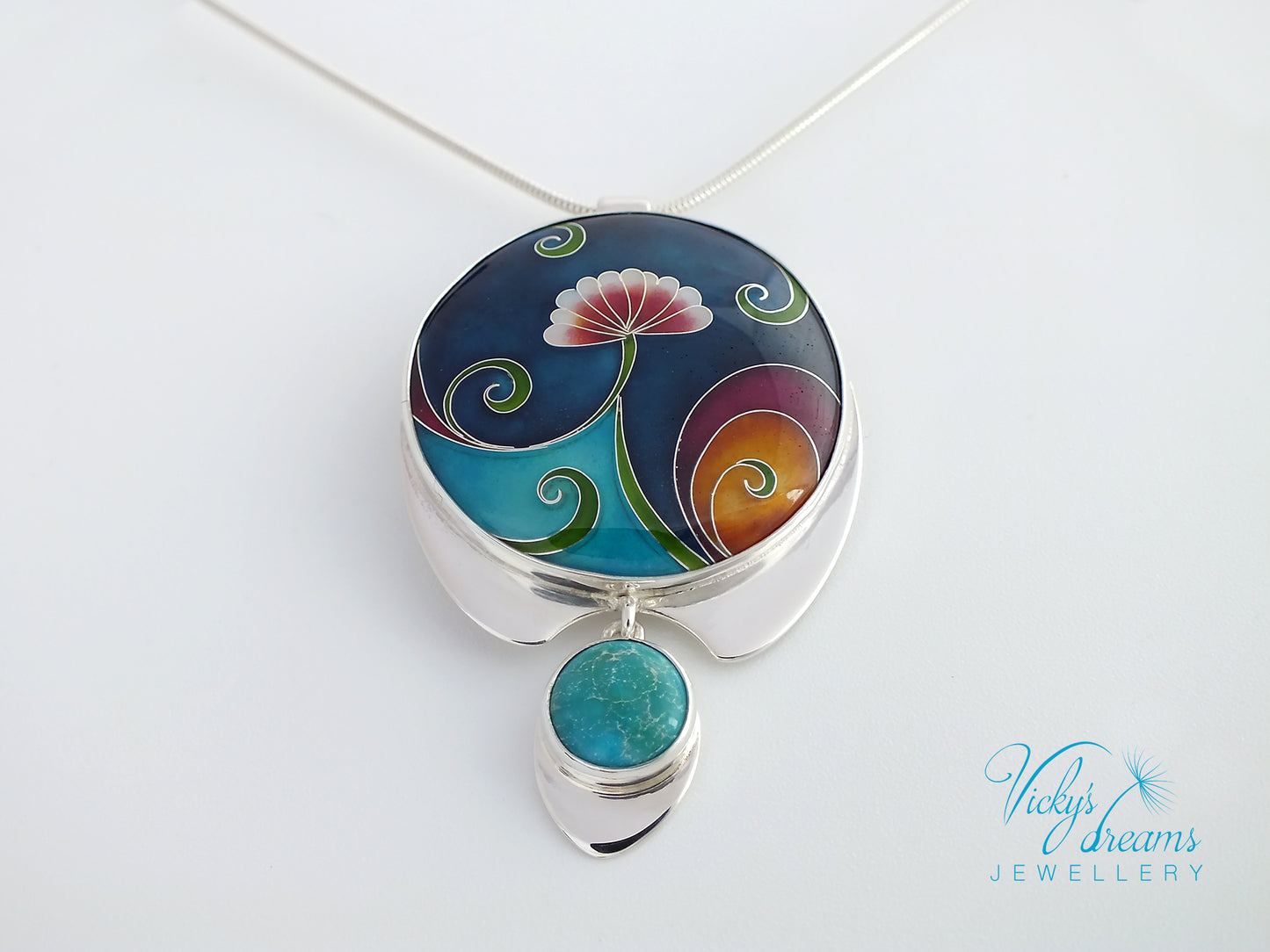Vibrant color flower and tendrils with natural turquoise