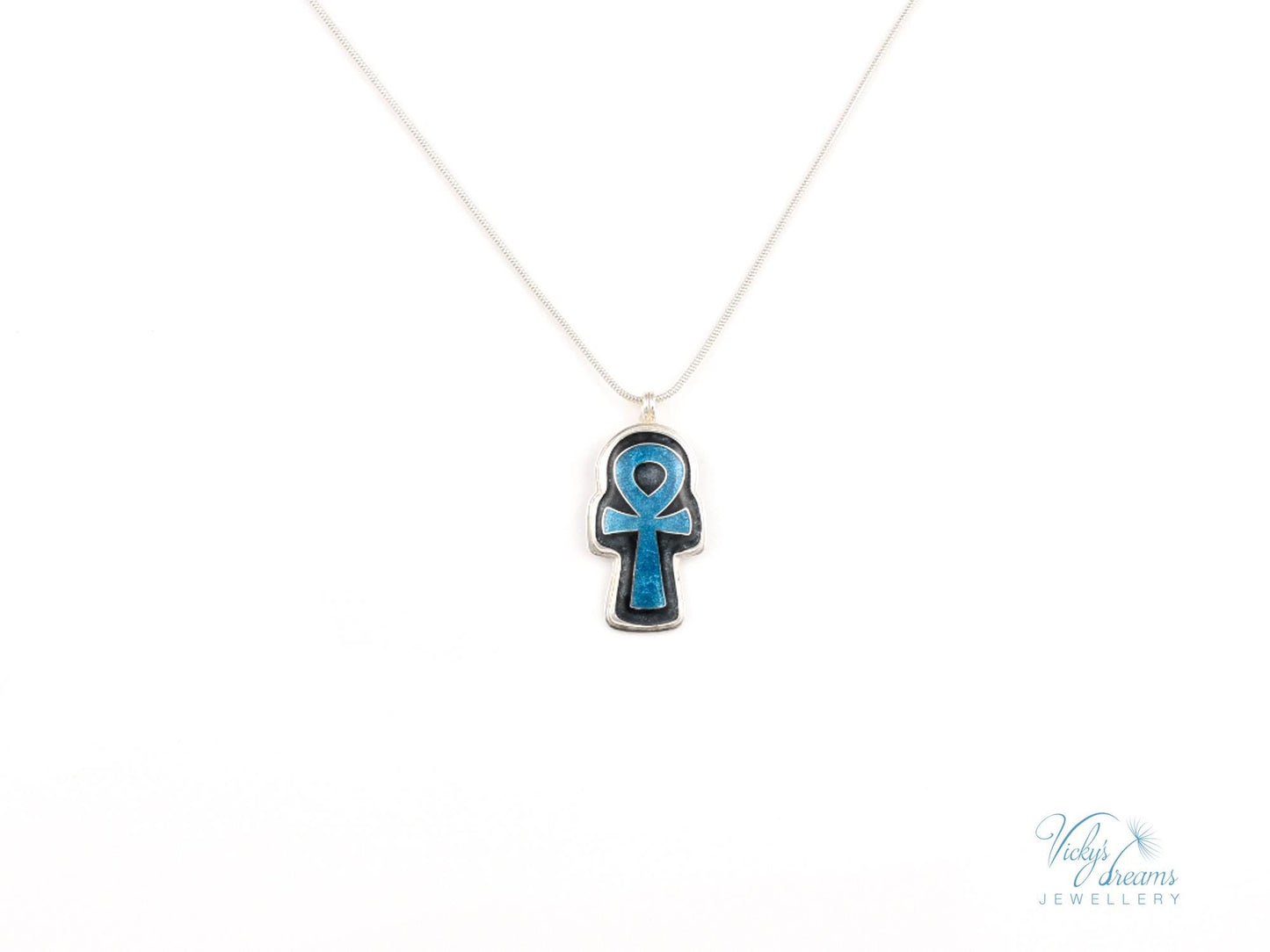 Handmade sterling silver Ankh pendant with colorful cloisonné enamel details.