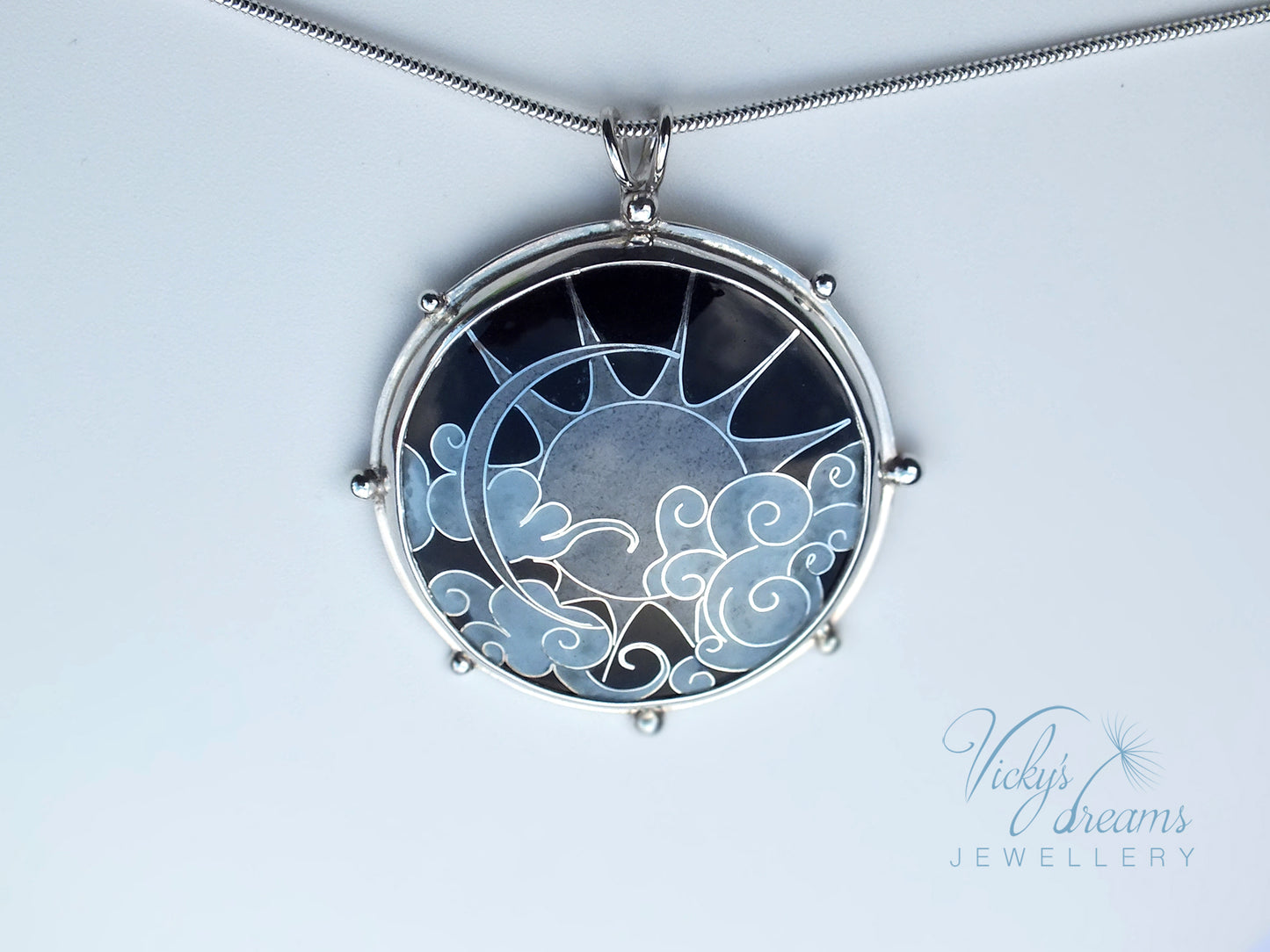 Grayscale Sun & Clouds necklace