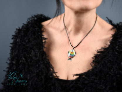 Hand-painted cloisonné enamel fish pendant in vibrant colors, set in sterling silver
