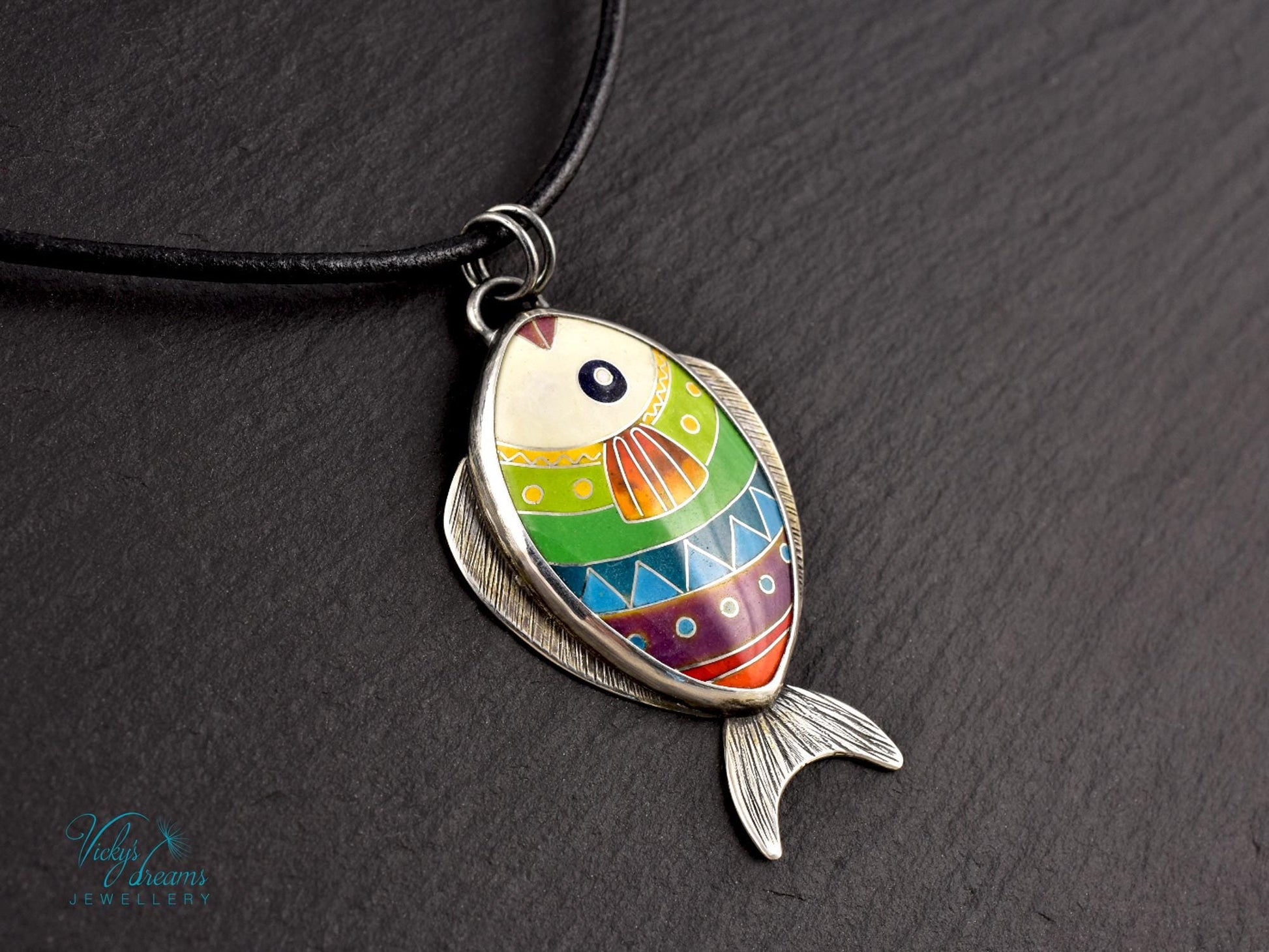 Hand-painted cloisonné enamel fish pendant in vibrant colors, set in sterling silver