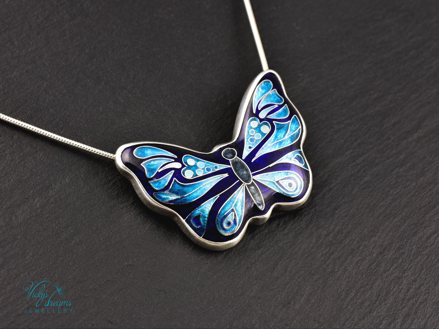 Handmade cloisonné butterfly pendant with antiqued sterling silver and red copper base