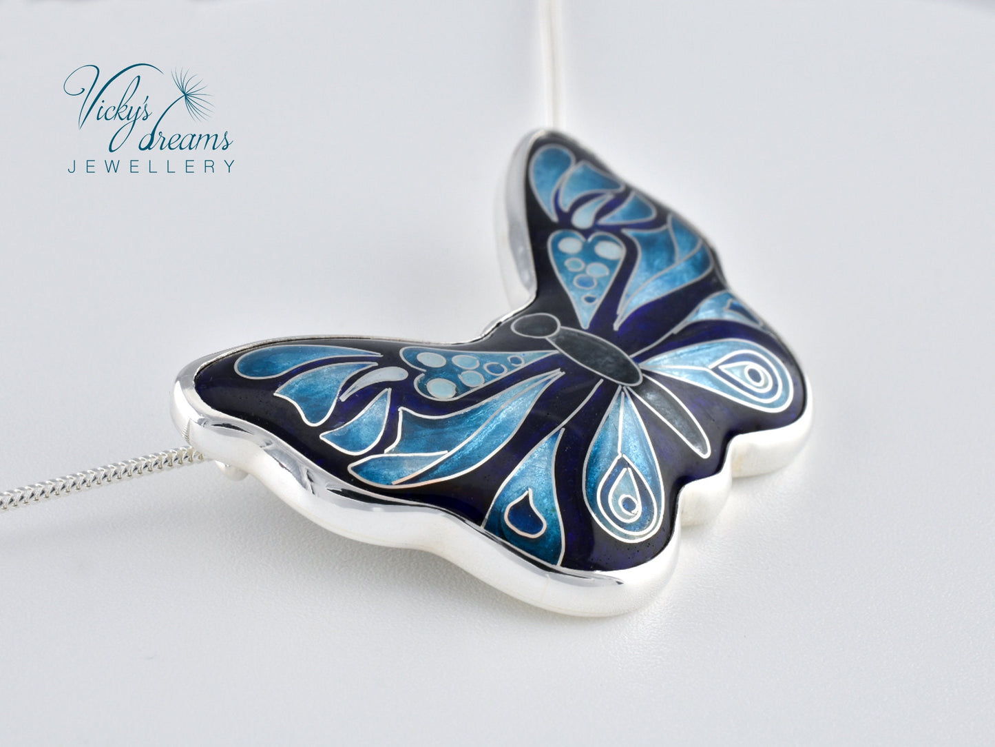 Handmade cloisonné butterfly pendant with antiqued sterling silver and red copper base