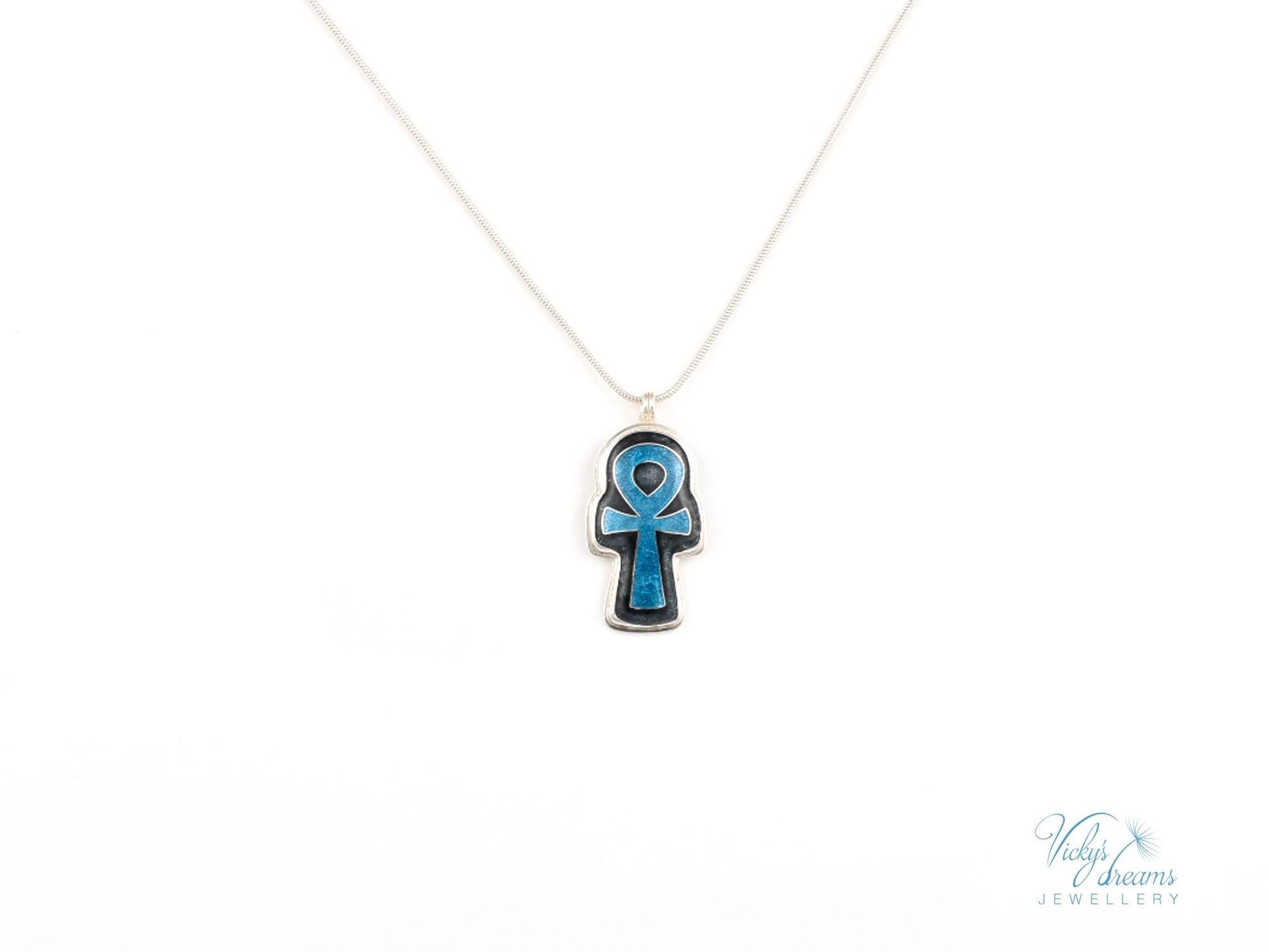 Handmade sterling silver Ankh pendant with colorful cloisonné enamel details.