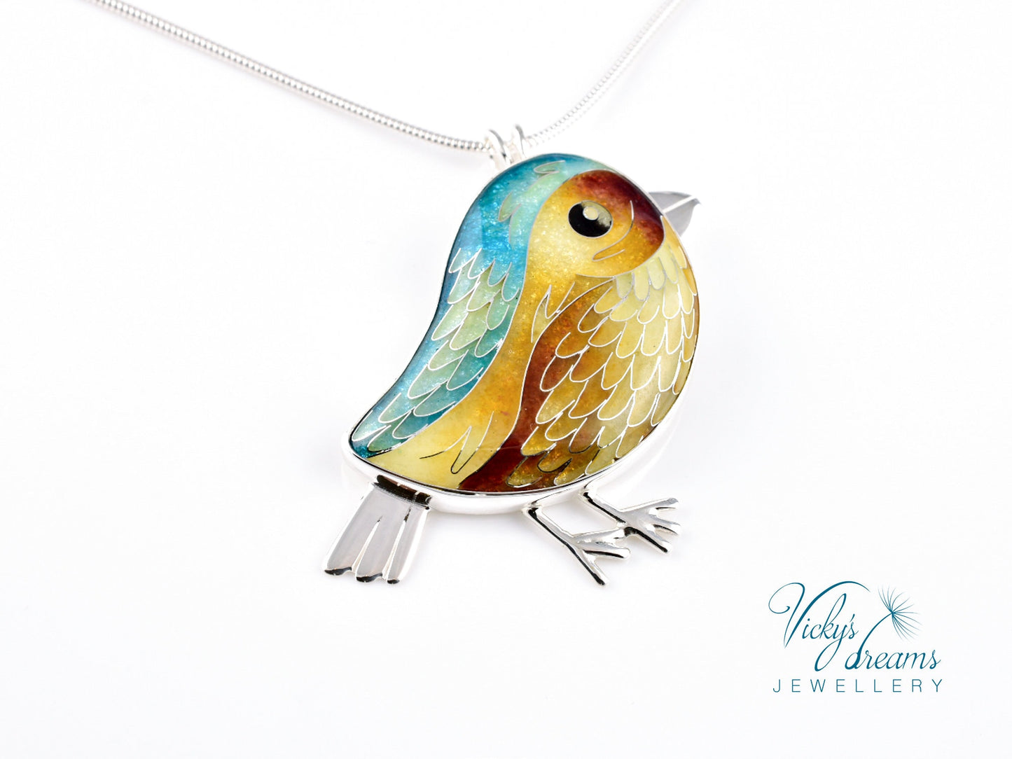 Vibrant blue, yellow & brown birdie