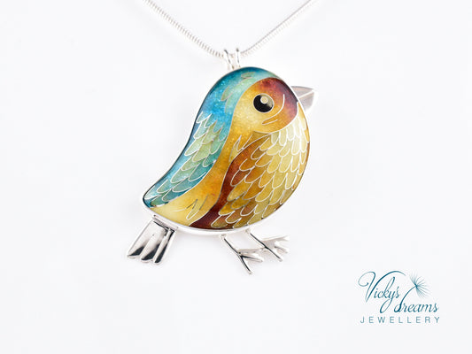 Vibrant blue, yellow & brown birdie